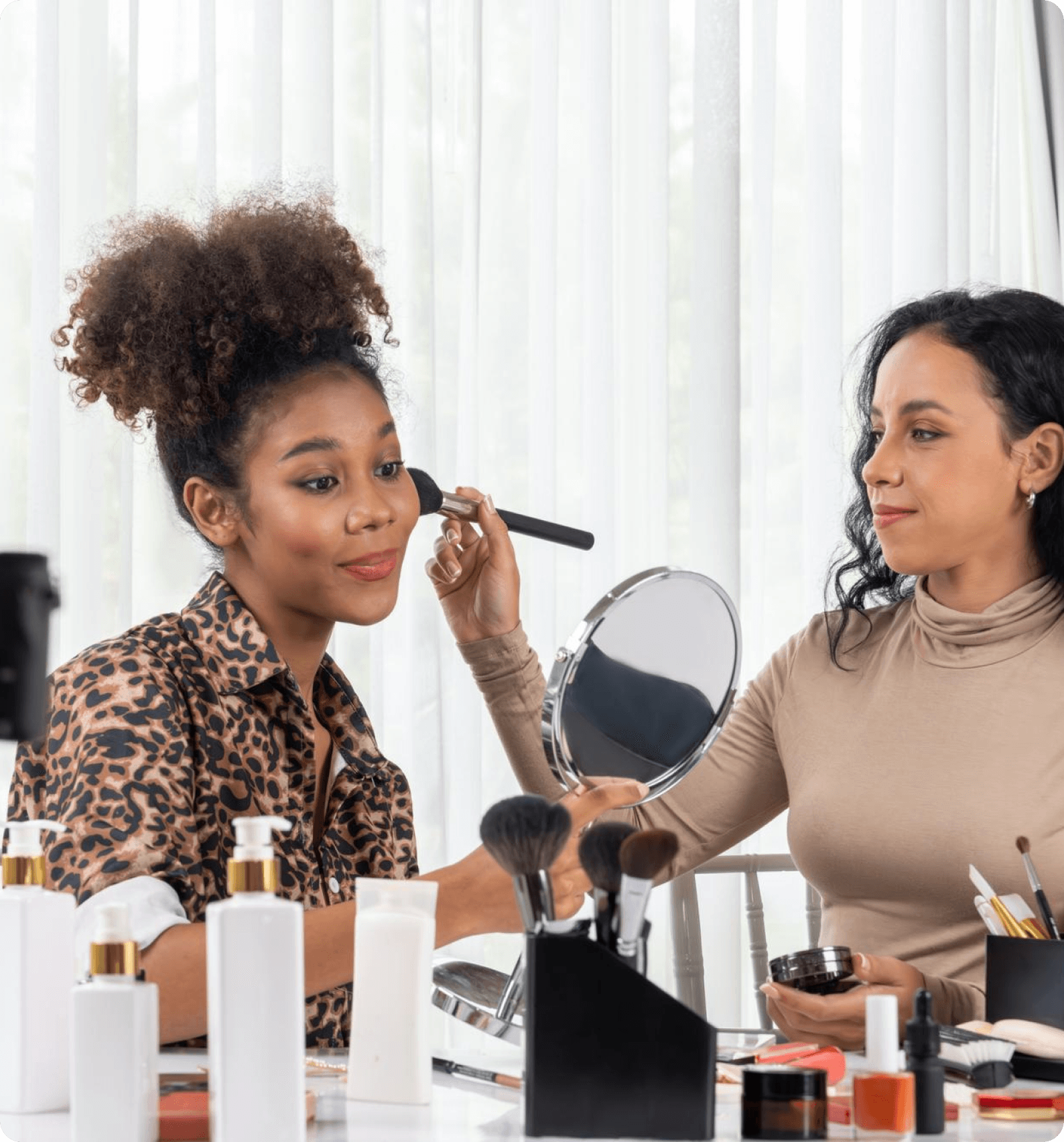 Stylist applying blush